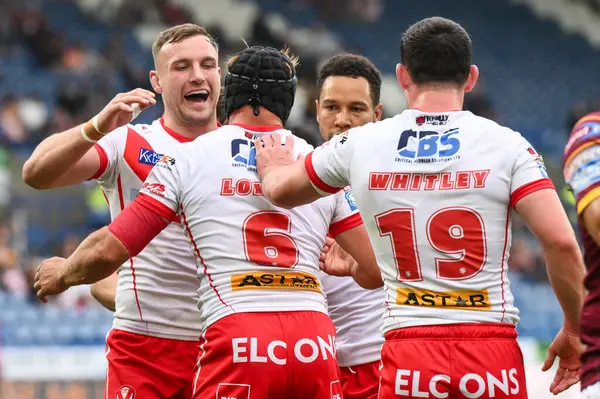 stock image Jonny Lomax of St. Helens celebrates his try during the Betfred Super League Round 24 match Huddersfield Giants vs St Helens at John Smith's Stadium, Huddersfield, United Kingdom, 1st September 2024