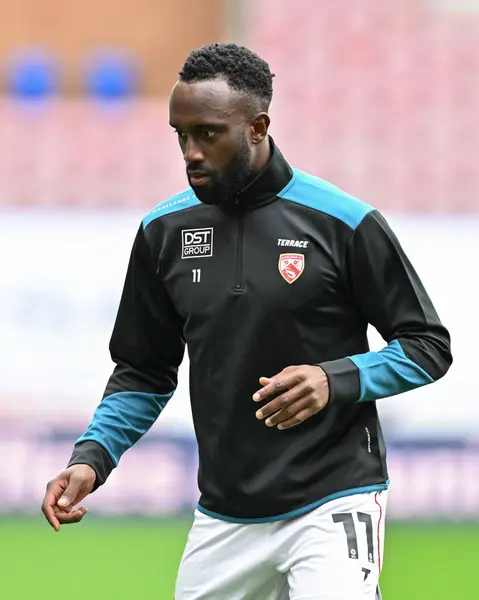 stock image Jordan Slew of Morecambe warms up ahead of the Bristol Street Motors Trophy match Wigan Athletic vs Morecambe at DW Stadium, Wigan, United Kingdom, 3rd September 2024