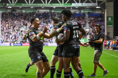 Wigan Warriors 'dan Junior Nsemba, 6 Eylül 2024' te Wigan Warriors vs Hull KR 'a karşı oynadığı Betfred Süper Lig karşılaşmasında şansını kutluyor.