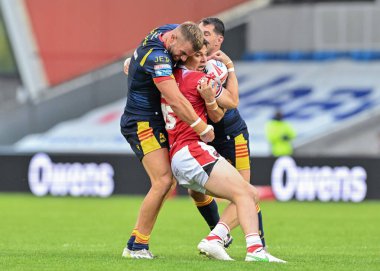 Shane Wright of Salford Red Devils gets tackled during the Betfred Super League Round 25 match Salford Red Devils vs Catalans Dragons at Salford Community Stadium, Eccles, United Kingdom, 7th September 2024 clipart