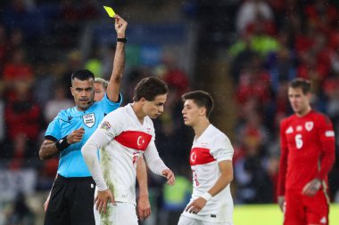 Trkiye 'den Kenan Yldz, 6 Eylül 2024' te Cardiff City Stadyumu 'nda UEFA Uluslar Ligi - B-Grubu 4 - Galler-Türkiye maçı sırasında hakem Rohit Saggi tarafından sarı kart gösterildi.