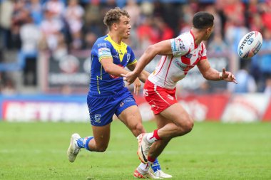 Warrington Wolves 'tan Cai Taylor-Wray Betfred Süper Lig 25. Raundda pas veriyor. Warrington Wolves St. Helens' e karşı. Halliwell Jones Stadyumu, Warrington, İngiltere, 7 Eylül 2024.