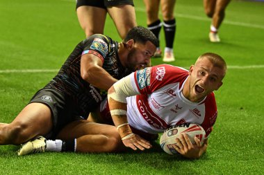 Hull KR 'dan Mikey Lewis, Betfred Süper Lig 25. Raundda Wigan Warriors Hull KR' a karşı oynadığı The Brick Community Stadyumu, Wigan, İngiltere 'de 6 Eylül 2024' te oynanan karşılaşmada 0-10 Hull 'a çıkmaya çalışıyor.