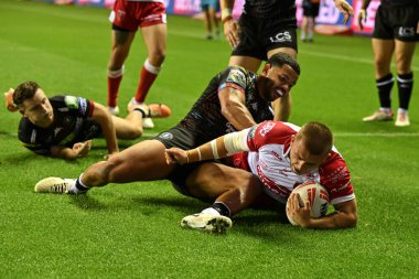 Hull KR 'dan Mikey Lewis, Betfred Süper Lig 25. Raundda Wigan Warriors Hull KR' a karşı oynadığı The Brick Community Stadyumu, Wigan, İngiltere 'de 6 Eylül 2024' te oynanan karşılaşmada 0-10 Hull 'a çıkmaya çalışıyor.