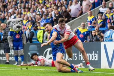 Warrington Wolves takımından Jack Welsby, Betfred Süper Lig 25. Raundda Warrington Wolves St. Helens 'e karşı Halliwell Jones Stadyumu, Warrington, İngiltere, 7 Eylül 2024' de oynanan karşılaşma öncesi deneme çizgisinden hemen önce, Warrington Wolves 'tan Matty Ashton' u yere serdi.