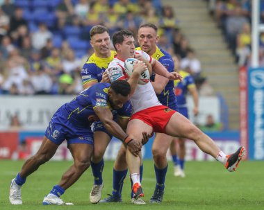 Warrington Wolves 'tan Rodrick Tai ve Warrington Wolves' tan George Williams, Betfred Süper Lig 25. Raundda Warrington Wolves St. Helens 'e karşı Halliwell Jones Stadyumu, Warrington, İngiltere, 7 Eylül 2024