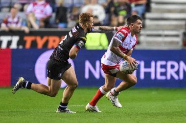 Hull KR 'dan Oliver Gildart, Wigan Warriors' tan Adam Keighran tarafından 6 Eylül 2024 'te Wigan Warriors - Hull KR maçında yenildi.