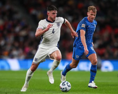 İngiltere 'den Declan Rice, UEFA Uluslar Ligi - B Grubu 2. İngiltere - İngiltere vFinlandiya Wembley Stadyumu, Londra, Birleşik Krallık, 10 Eylül 2024 tarihinde top ile bir ara verdi.