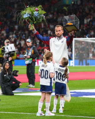 Harry Kane of England receives his golden cap for his 100th appearance for England in tonights  UEFA Nations League - League B - Group 2 England v Finland at Wembley Stadium, London, United Kingdom, 10th September 2024 clipart