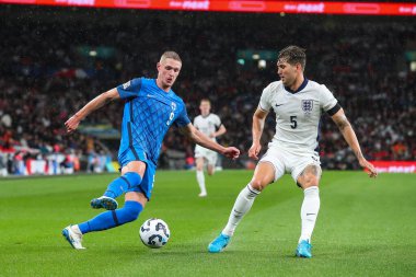 Fredrik Jensen of Finland takes on John Stones of England during the UEFA Nations League - League B - Group 2 England v Finland at Wembley Stadium, London, United Kingdom, 10th September 2024 clipart