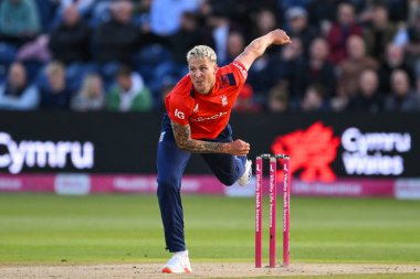 Brydon Carse of England delivers the ball during the Second Vitality IT20 Series England v Australia at Sophia Gardens Cricket Ground, Cardiff, United Kingdom, 13th September 202 clipart