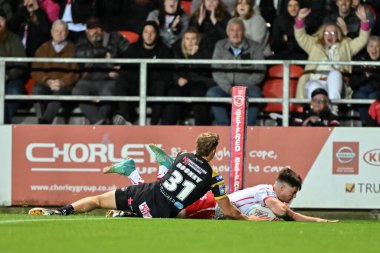 St. Helens takımından Jon Bennison, 3 Eylül 2024 'te St Helens Castleford Tigers' a karşı oynanan Betfred Süper Lig 26. Maçı 'nda 30-4 St Helens' e galibiyet kazandırmaya çalışıyor.