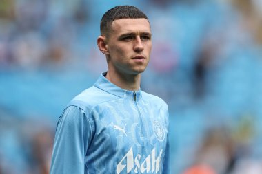 Manchester City 'den Phil Foden Premier League maçında ısınma turunda Manchester City, Etihad Stadyumu' nda Brentford 'a karşı 14 Eylül 2024