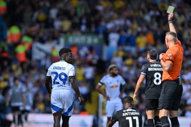 Referee James Bell yellow cards Wilfried Gnonto of Leeds United during the Sky Bet Championship match Leeds United vs Burnley at Elland Road, Leeds, United Kingdom, 14th September 202 clipart