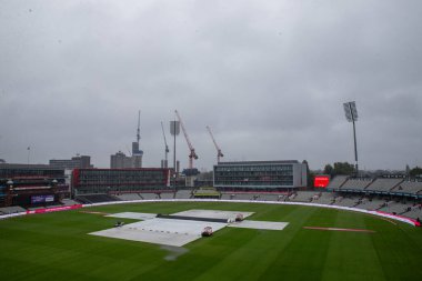 A general view inside of Old Trafford with the rain covers on ahead of the Third Vitality IT20 Series match England vs Australia at Old Trafford, Manchester, United Kingdom, 15th September 2024 clipart