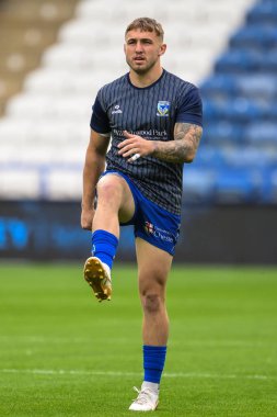 Warrington Wolves takımından Sam Powell, Betfred Süper Lig 26. Raundu öncesinde John Smith 'in Stadyumu' nda Huddersfield Giants ve Warrington Wolves maçında ısındı.