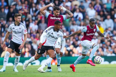 Crysencio Summerville of West Ham United breaks with the ball during the Premier League match Fulham vs West Ham United at Craven Cottage, London, United Kingdom, 14th September 2024 clipart