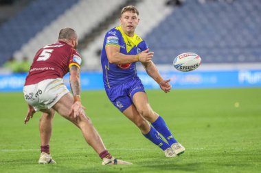 Warrington Wolves 'tan George Williams, Betfred Süper Lig 26. Raundda John Smith Stadyumu' nda Huddersfield Giants 'a karşı Warrington Wolves maçında pas attı.