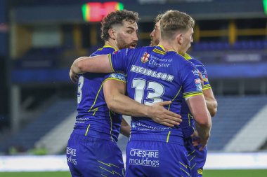 Warrington Wolves 'un Toby King' i Betfred Süper Lig 26. Raundda Huddersfield Giants ile Warrington Wolves maçında John Smith 'in Stadyumu, Huddersfield, Birleşik Krallık' ta 14 Eylül 2024 'te yaptığı maçı kutluyor.