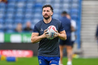 Toby King of Warrington Wolves during pre match warm up ahead of the Betfred Super League Round 26 match Huddersfield Giants vs Warrington Wolves at John Smith's Stadium, Huddersfield, United Kingdom, 14th September 2024 clipart