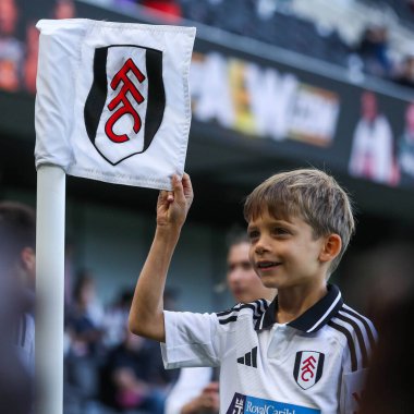 A Fulham fans poses for a phot prior to the Premier League match Fulham vs West Ham United at Craven Cottage, London, United Kingdom, 14th September 2024 clipart