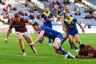 Warrington Wolves takımından Matty Nicholson, 14 Eylül 2024 'te John Smith Stadyumu' nda oynanan Betfred Süper Lig 26. Raundda Huddersfield Giants 'a karşı Warrington Wolves maçına gidiyor.
