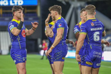 Warrington Wolves 'tan Matty Ashton, Betfred Süper Lig 26. Raundda John Smith Stadyumu' nda Huddersfield Giants ve Warrington Wolves maçında denemesini kutluyor.