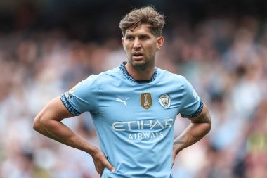 Manchester City 'den John Stones Premier League maçı sırasında Manchester City, Etihad Stadyumu' nda Brentford 'a karşı, 14 Eylül 2024