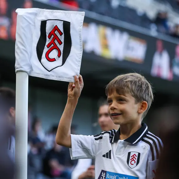 stock image A Fulham fans poses for a phot prior to the Premier League match Fulham vs West Ham United at Craven Cottage, London, United Kingdom, 14th September 2024