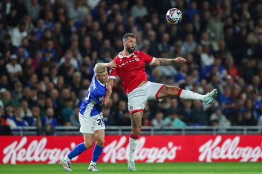 Wrexham 'dan Ollie Palmer, 16 Eylül 2024' te Birmingham City 'nin St. Andrew' s @ Knighthead Park, Birmingham 'daki Wrexham maçında topu yere indiriyor.