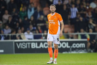 Matthew Pennington of Blackpool during the Carabao Cup match Blackpool vs Sheffield Wednesday at Bloomfield Road, Blackpool, United Kingdom, 17th September 2024 clipart