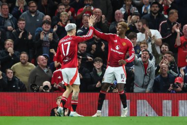 Manchester United 'dan Alejandro Garnacho, 17 Eylül 2024 tarihinde Old Trafford, Manchester, İngiltere' de oynanan Carabao Kupası 3. tur karşılaşmasında 4-0 kazanma golünü kutluyor.