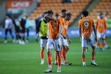 Matthew Pennington of Blackpool reacts to his team's loss after the Carabao Cup match Blackpool vs Sheffield Wednesday at Bloomfield Road, Blackpool, United Kingdom, 17th September 2024 clipart