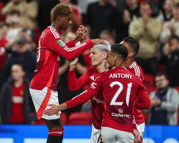 stock image Alejandro Garnacho of Manchester United celebrates his goal to make it 3-0 during the Carabao Cup 3rd Round match Manchester United vs Barnsley at Old Trafford, Manchester, United Kingdom, 17th September 2024