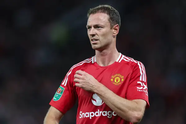 stock image Jonny Evans of Manchester United during the Carabao Cup 3rd Round match Manchester United vs Barnsley at Old Trafford, Manchester, United Kingdom, 17th September 2024