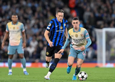 Manchester City 'den Phil Foden, 18 Eylül 2024' te Etihad Stadyumu 'nda Manchester City ile Inter Milan arasında oynanan UEFA Şampiyonlar Ligi sahne maçı sırasında eylemde.