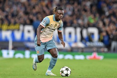 Manchester City 'den Jrmy Doku, 18 Eylül 2024' te Etihad Stadyumu 'nda Manchester City ile Inter Milan arasındaki UEFA Şampiyonlar Ligi sahne maçı sırasında eylemde.