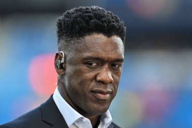 Former football Clarence Seedorf speaks with television ahead of the UEFA Champions League league stage match Manchester City vs Inter Milan at Etihad Stadium, Manchester, United Kingdom, 18th September 2024 clipart