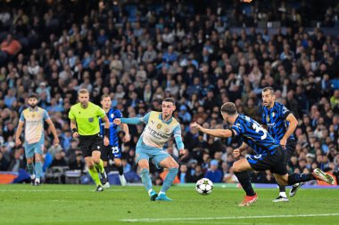 Manchester City 'den Phil Foden, 18 Eylül 2024' te Etihad Stadyumu 'nda Manchester City ile Inter Milan arasındaki UEFA Şampiyonlar Ligi sahne maçında gol atarken görülüyor.