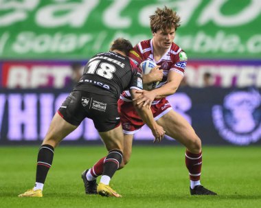 Wigan Warriors 'dan Ethan Havard, 17 Eylül 2024' te İngiltere 'nin Wigan kentindeki The Brick Community Stadyumu' nda oynanan Betfred Süper Lig Maçı 'nda Ben Hellewell tarafından oynanan Wigan Warriors - Salford Red Devils maçında yenildi.