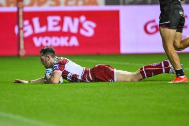 Wigan Warriors 'tan Jake Wardle 27. Betfred Süper Lig Turu' nda Wigan Warriors 'a karşı Salford Red Devils maçında Wigan, Wigan, Birleşik Krallık' ta 19 Eylül 2024 'de mücadele edecek.