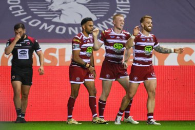 Zach Eckersley of Wigan Warriors celebrates his try during the Betfred Super League Round 27 match Wigan Warriors vs Salford Red Devils at The Brick Community Stadium, Wigan, United Kingdom, 19th September 2024 clipart