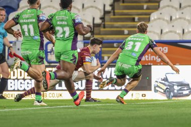 Aidan McGowan of Huddersfield Giants goes over for a try during the Betfred Super League Round 27 match Huddersfield Giants vs Castleford Tigers at John Smith's Stadium, Huddersfield, United Kingdom, 19th September 2024 clipart