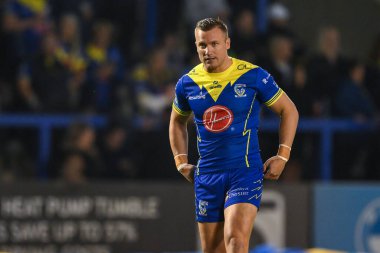 Warrington Wolves takımından Josh Drinkwater 27. Betfred Süper Lig Turu öncesinde ısınma turunda Warrington Wolves Londra Broncos 'a karşı Halliwell Jones Stadyumu, Warrington, İngiltere, 20 Eylül 2024