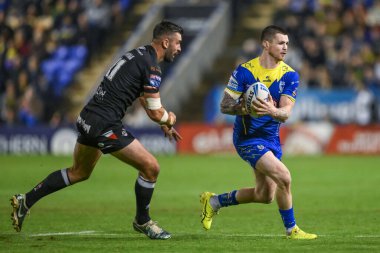 Warrington Wolves takımından Josh Drinkwater, 20 Eylül 202 'de Warrington, İngiltere' deki Halliwell Jones Stadyumu 'nda oynanan 27.