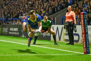 Warrington Wolves 'tan Matty Ashton, 27. Betfred Süper Lig Turu' nda Warrington Wolves 'a karşı London Broncos maçında 20 Eylül 2024' te Warrington, İngiltere 'deki Halliwell Jones Stadyumu' nda şansını deniyor.