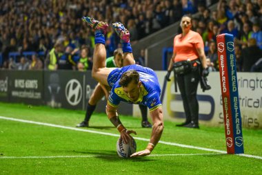 Warrington Wolves 'tan Matty Ashton, 27. Betfred Süper Lig Turu' nda Warrington Wolves 'a karşı London Broncos maçında 20 Eylül 2024' te Warrington, İngiltere 'deki Halliwell Jones Stadyumu' nda şansını deniyor.
