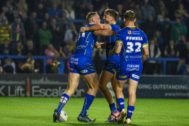 Warrington Wolves takımından Ben Currie, 27. Betfred Süper Lig Turu 'nda Warrington Wolves' a karşı Londra Broncos karşılaşmasını 20 Eylül 2024 'te Halliwell Jones Stadyumu' nda kutluyor.