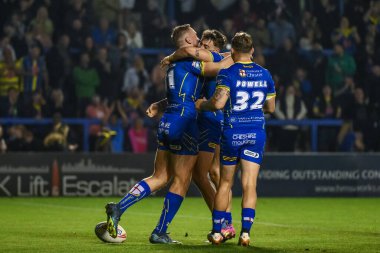 Warrington Wolves takımından Ben Currie, 27. Betfred Süper Lig Turu 'nda Warrington Wolves' a karşı Londra Broncos karşılaşmasını 20 Eylül 2024 'te Halliwell Jones Stadyumu' nda kutluyor.