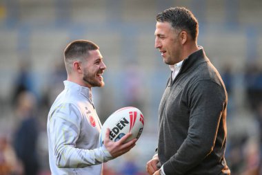Warrington Wolves 'dan Danny Walker ve Warrington Wolves' un baş antrenörü Sam Burgess, 20 Eylül 2024 'te Halliwell Jones Stadyumu' nda oynanan 27.